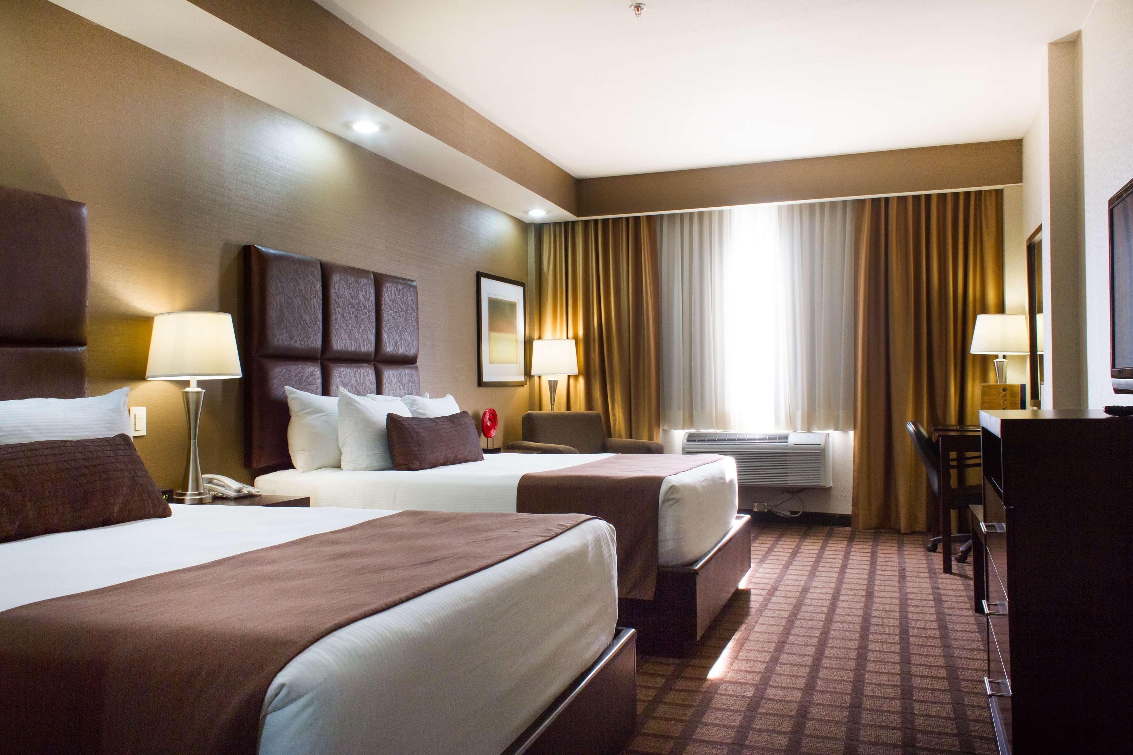 Best Western Premier Monterrey Aeropuerto Apodaca エクステリア 写真 A typical hotel room