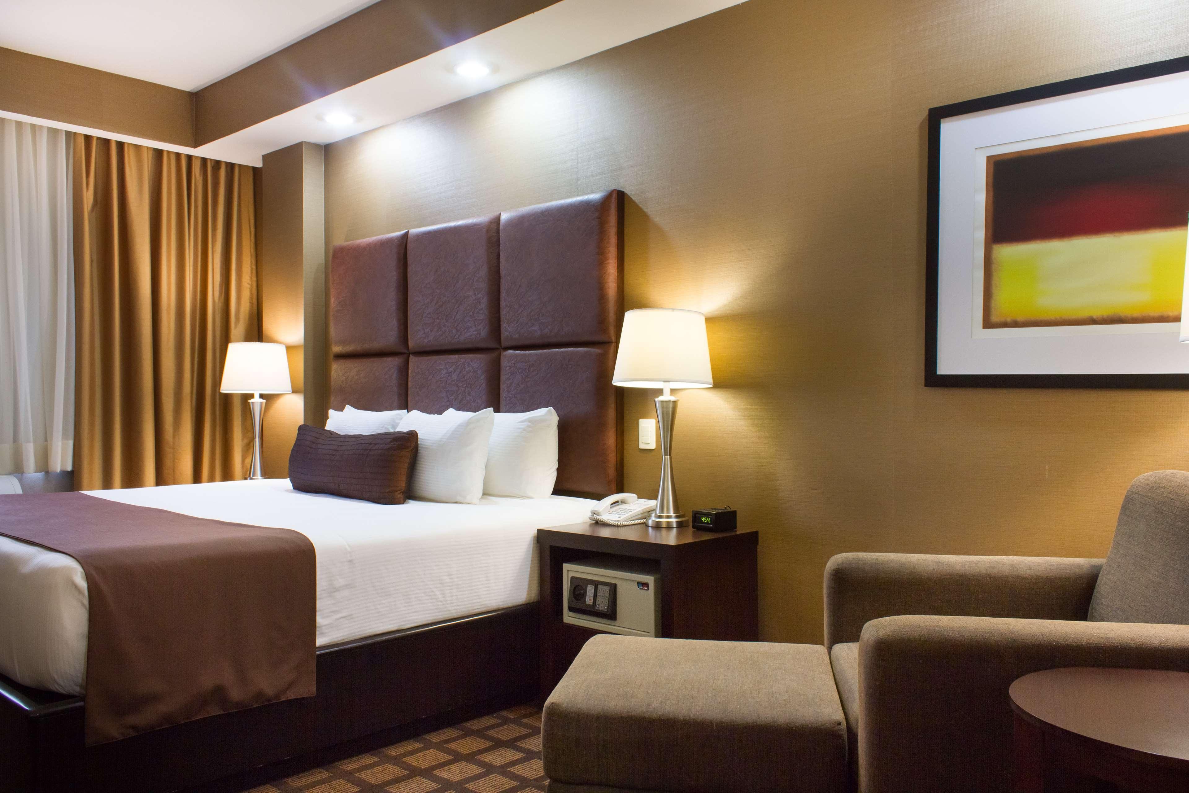 Best Western Premier Monterrey Aeropuerto Apodaca エクステリア 写真 A typical room at the hotel