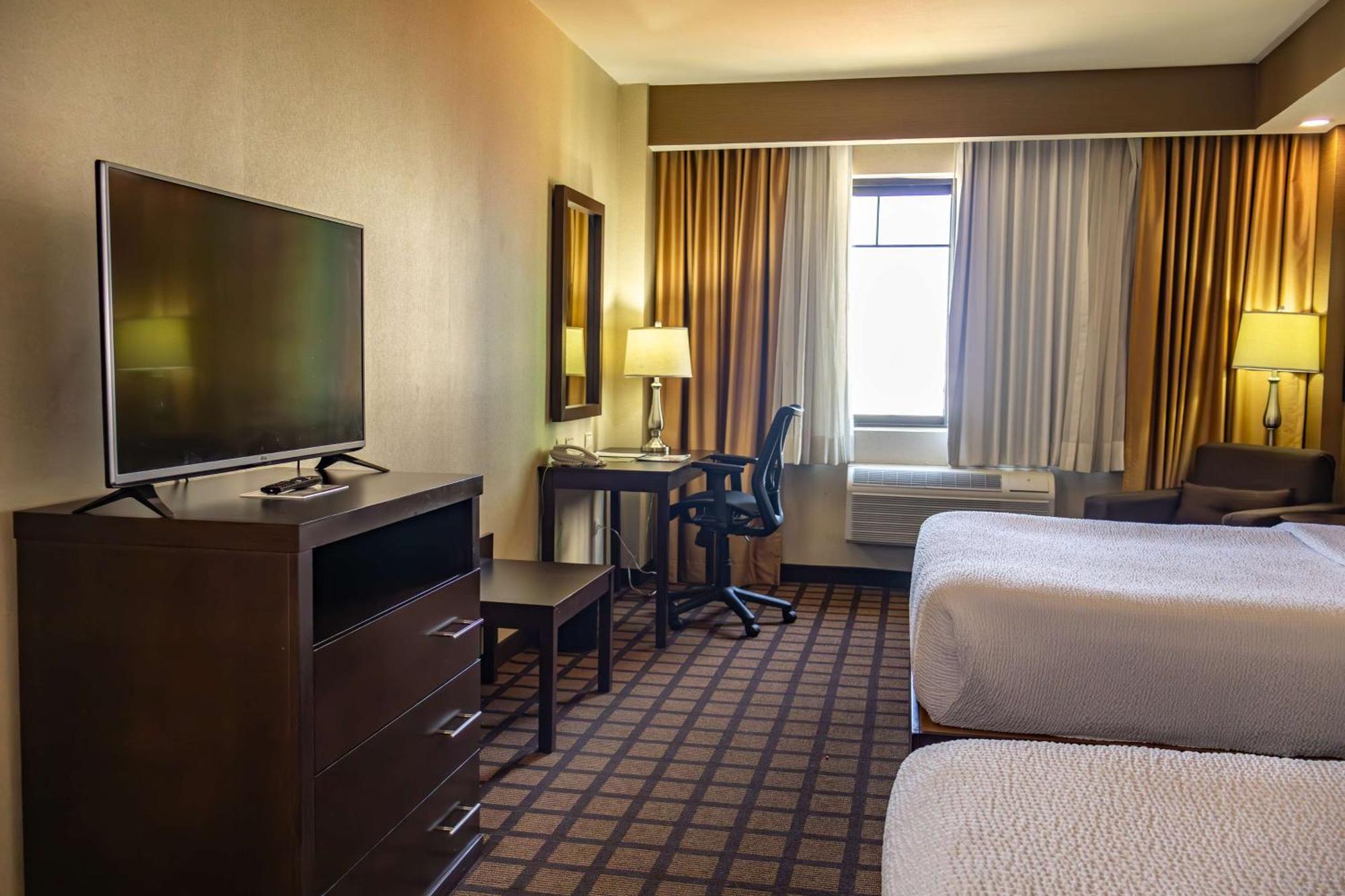 Best Western Premier Monterrey Aeropuerto Apodaca エクステリア 写真 A typical room at the Hilton Garden Inn