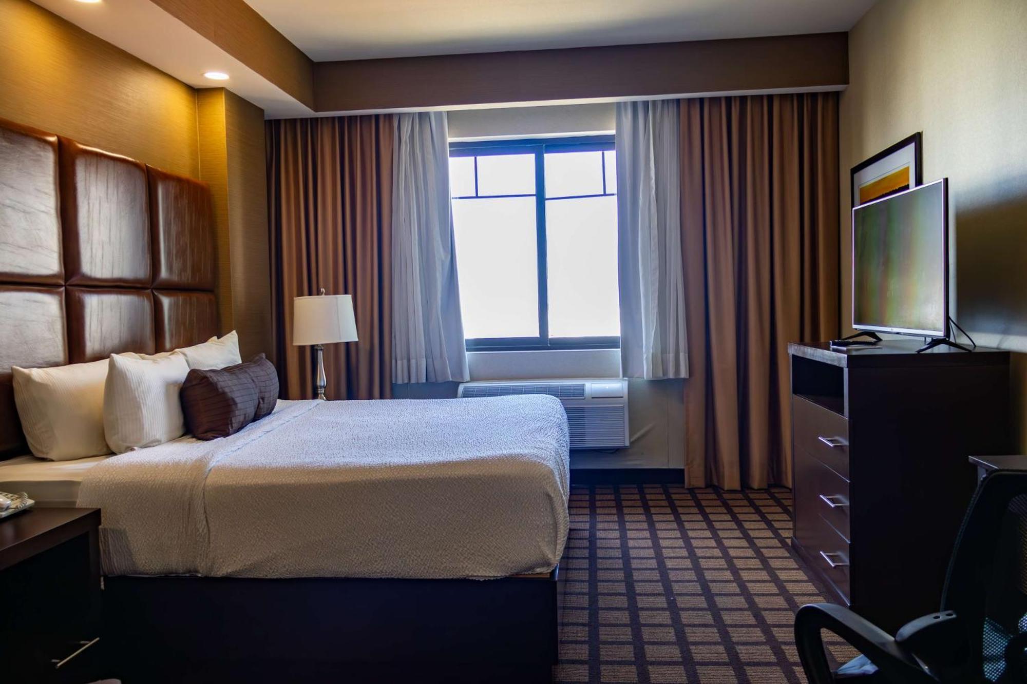 Best Western Premier Monterrey Aeropuerto Apodaca エクステリア 写真 A typical bedroom in a typical hotel